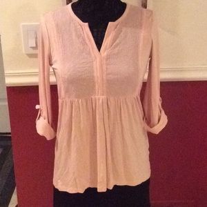 Super soft pink blouse.